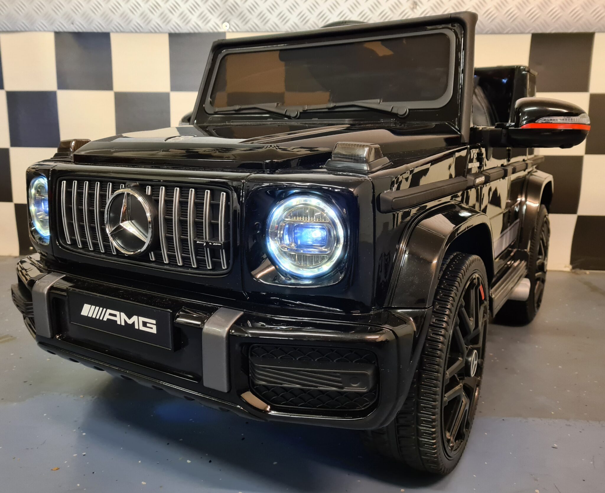 Kinderauto Mercedes G63 12V zwart 1-persoons