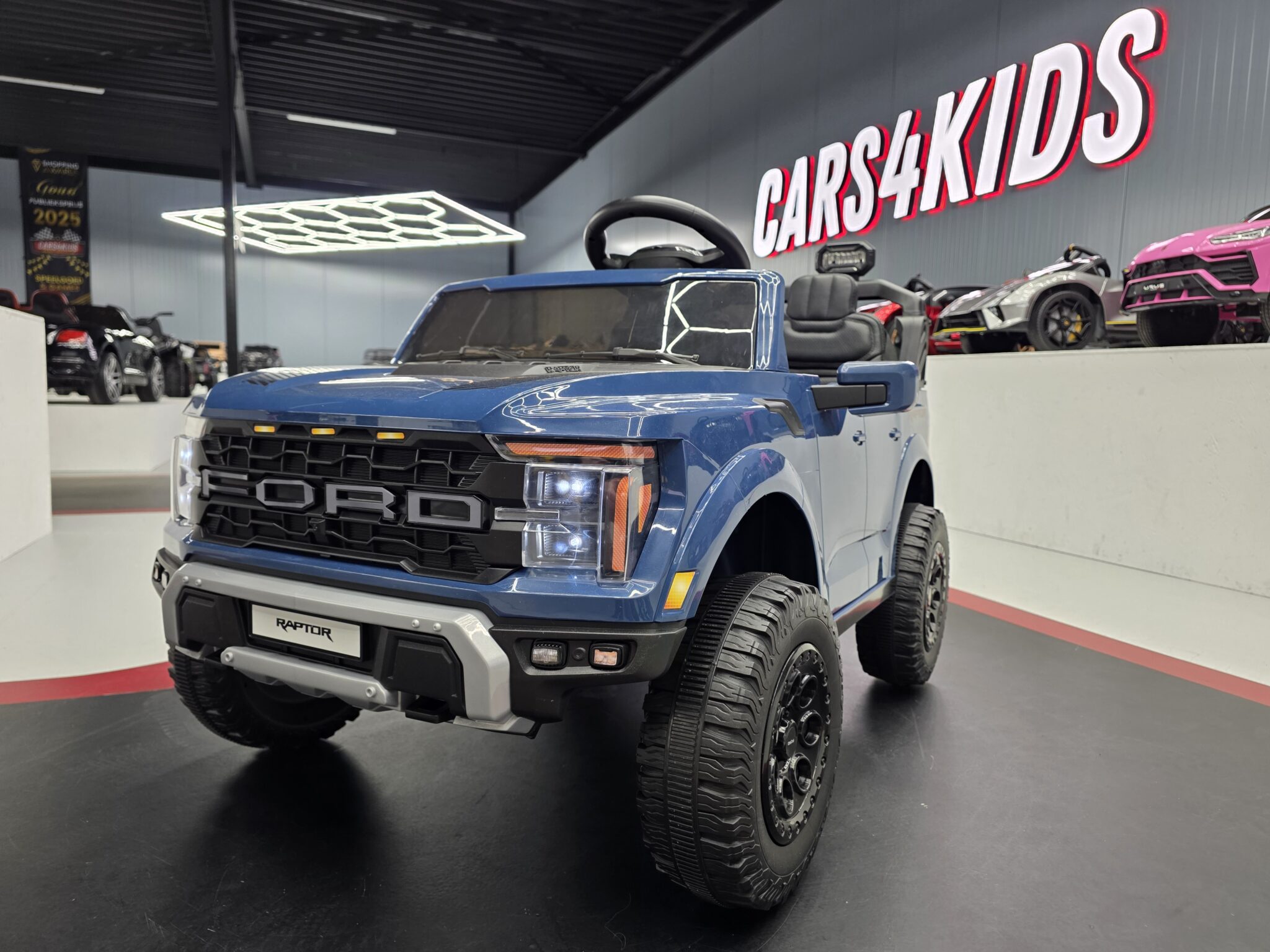 Elektrische kinderauto Ford Raptor 2-persoons 24 volt blauw