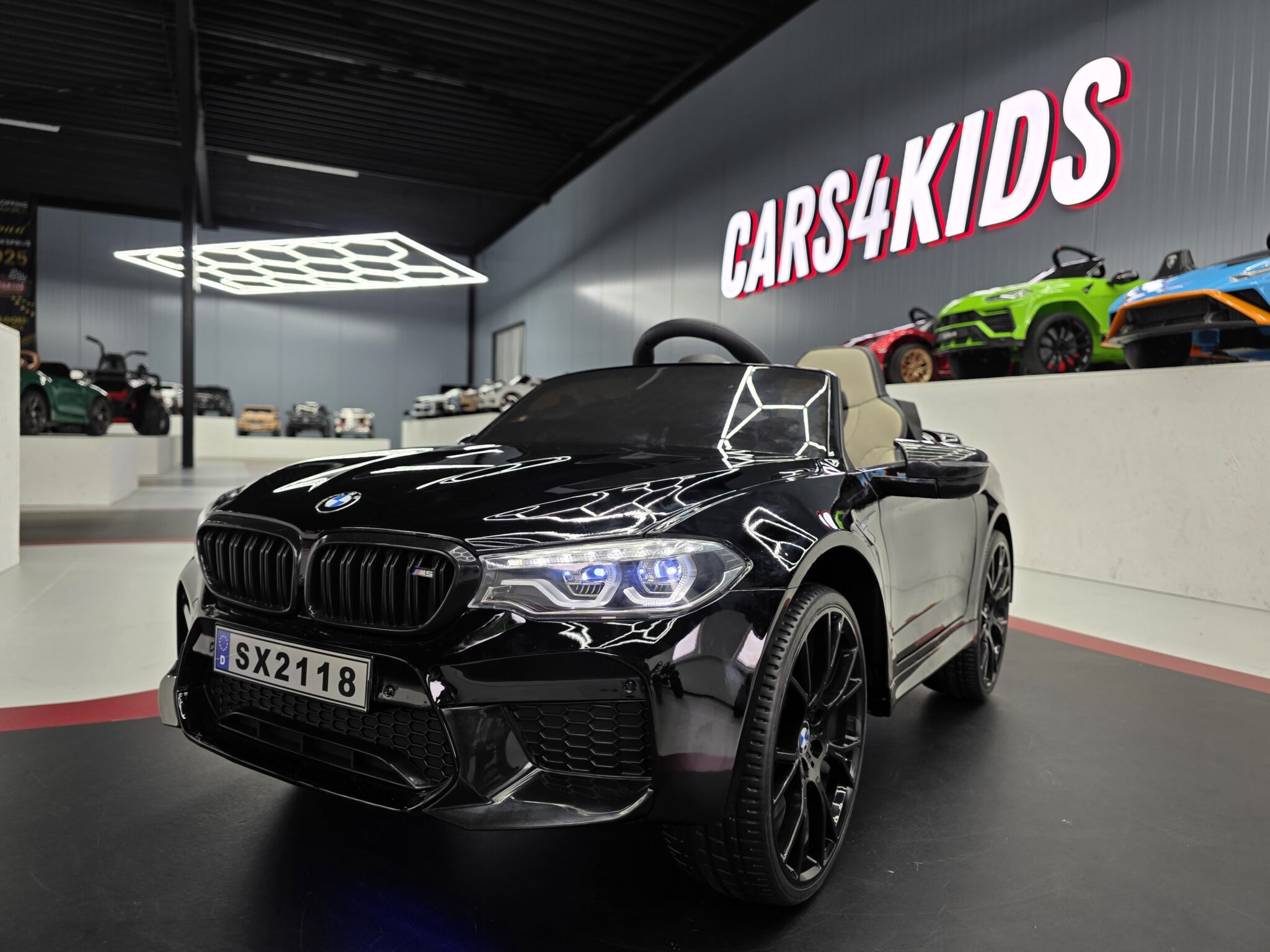 BMW M5 24 volt metallic zwarte kinderauto