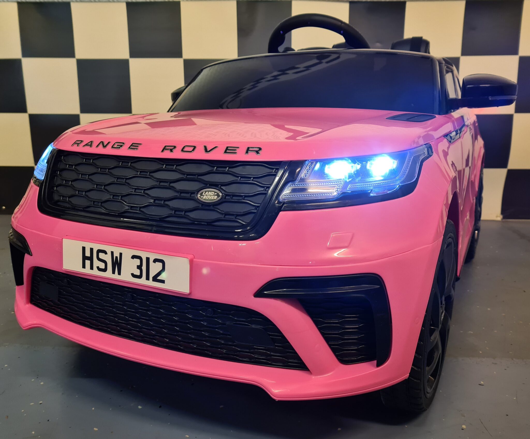 Range Rover Velar 12V 2.4G RC roze kinderauto op accu
